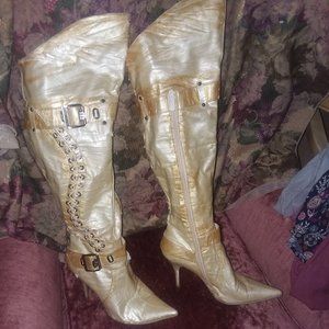 Pale Gold faux leather laceup boots .